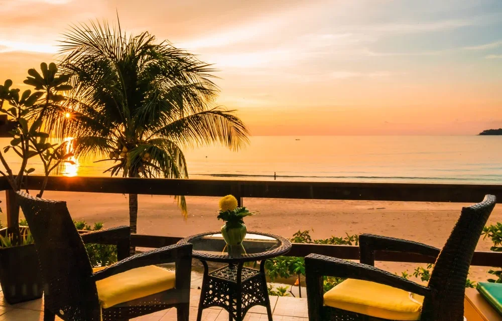 Sunset view of Kamala Beach taken from a beachfront room balcony at Layalina Hotel Phuket.