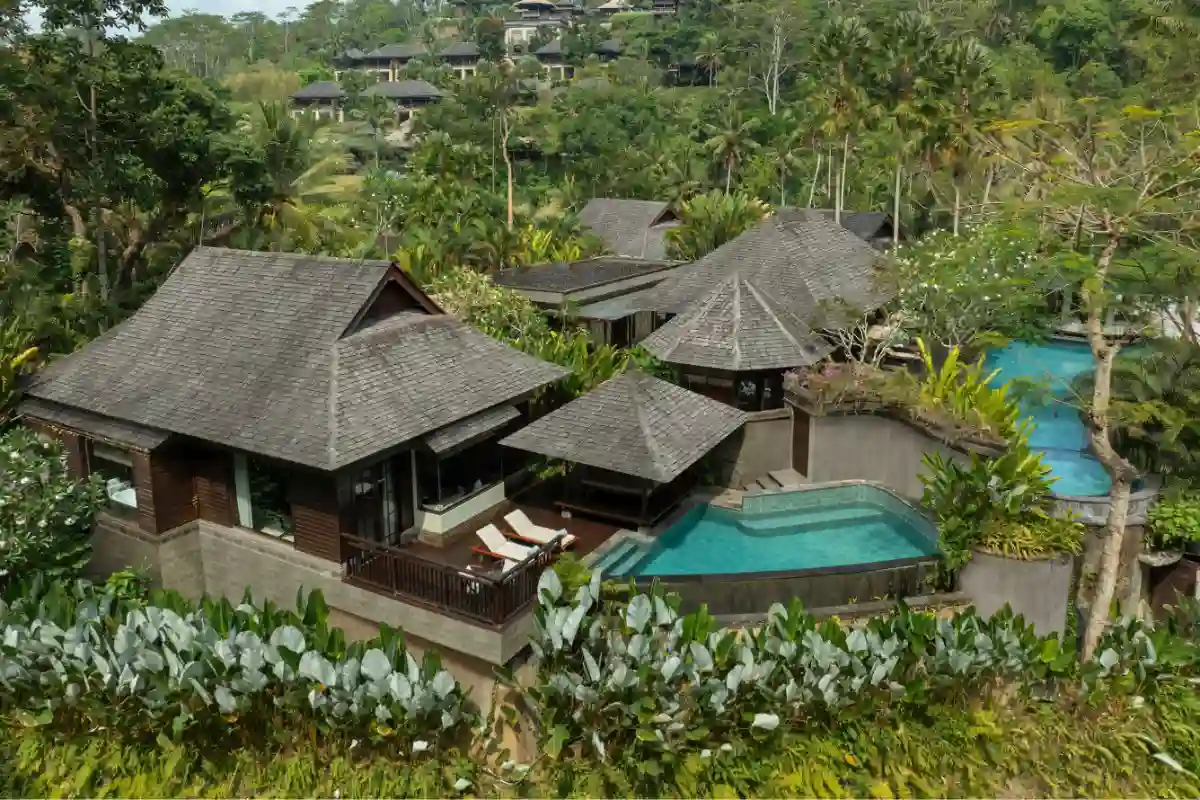 Aerial view of a private pool villa surrounded by tropical jungle at Mandapa, a Ritz-Carlton Reserve in Ubud, Bali.