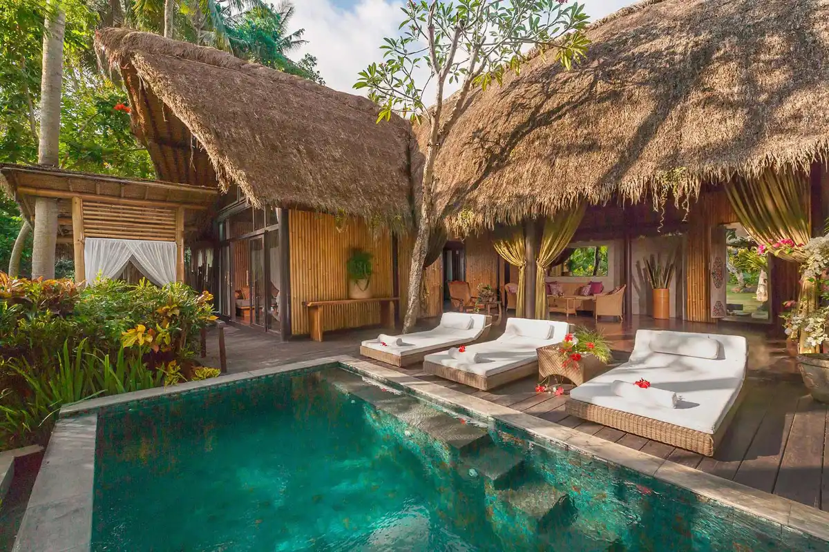 Outdoor private pool and sun loungers at Fivelements Retreat Bali Two Bedroom Riverfront Suite.