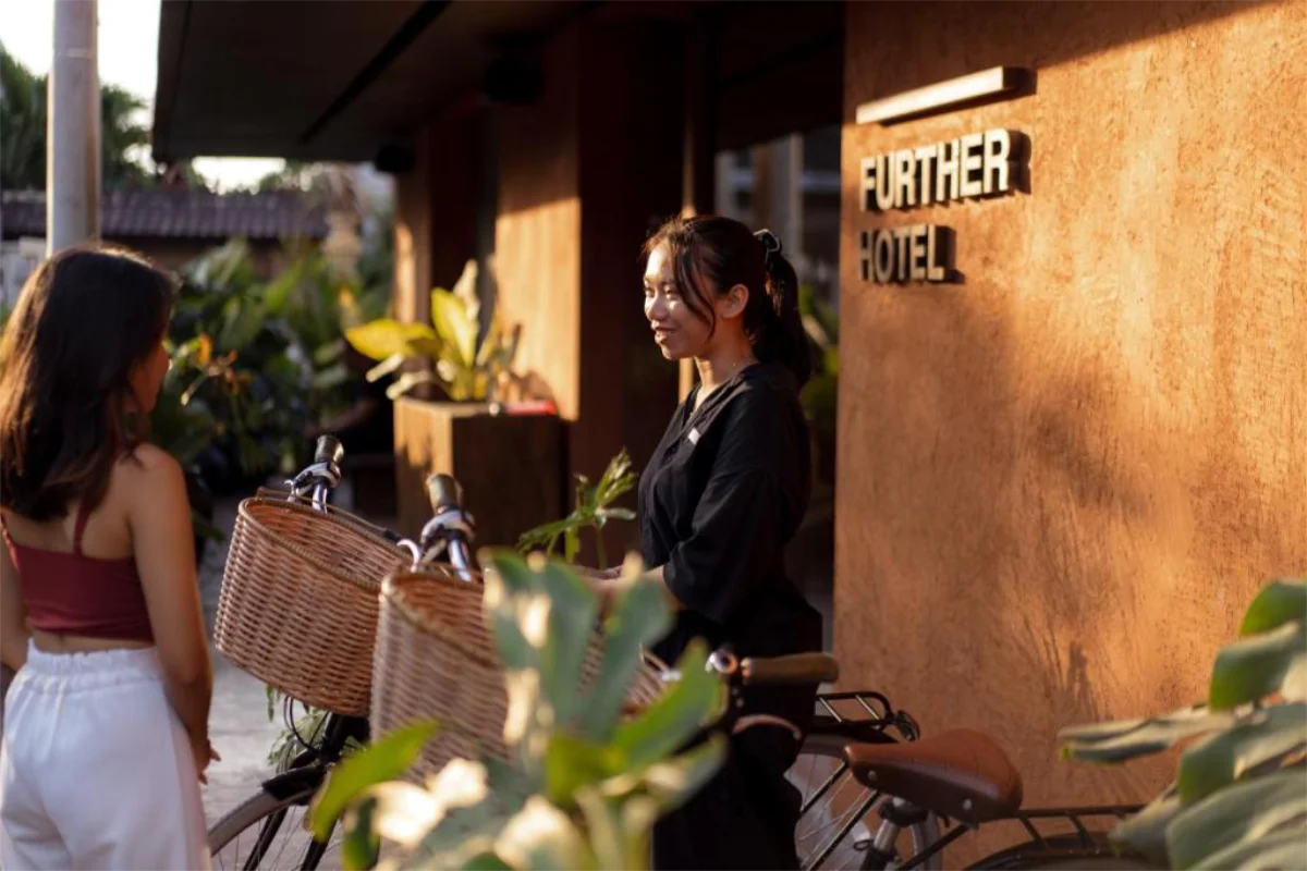 Further Hotel Pererenan entrance guests receiving complimentary bicycles