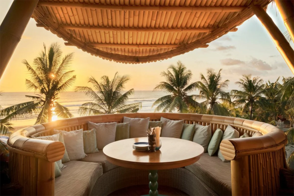 Bamboo sunset pod seating at Azul Beach Club in Bali Mandira Beach Resort overlooking Legian beach ocean view