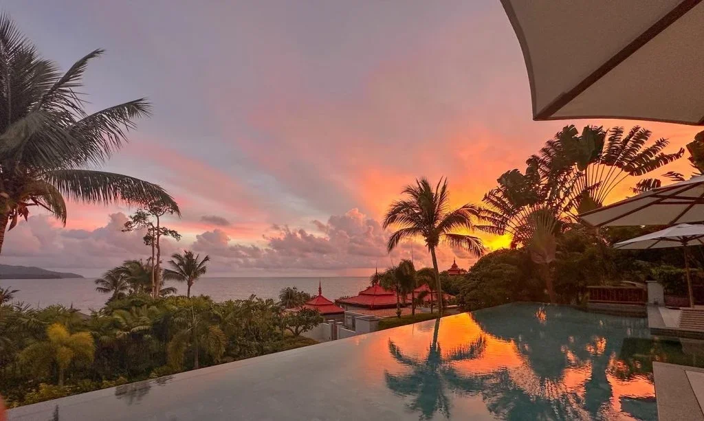 Sunset and ocean view from the private infinity pool at Trisara Villas & Residences Phuket