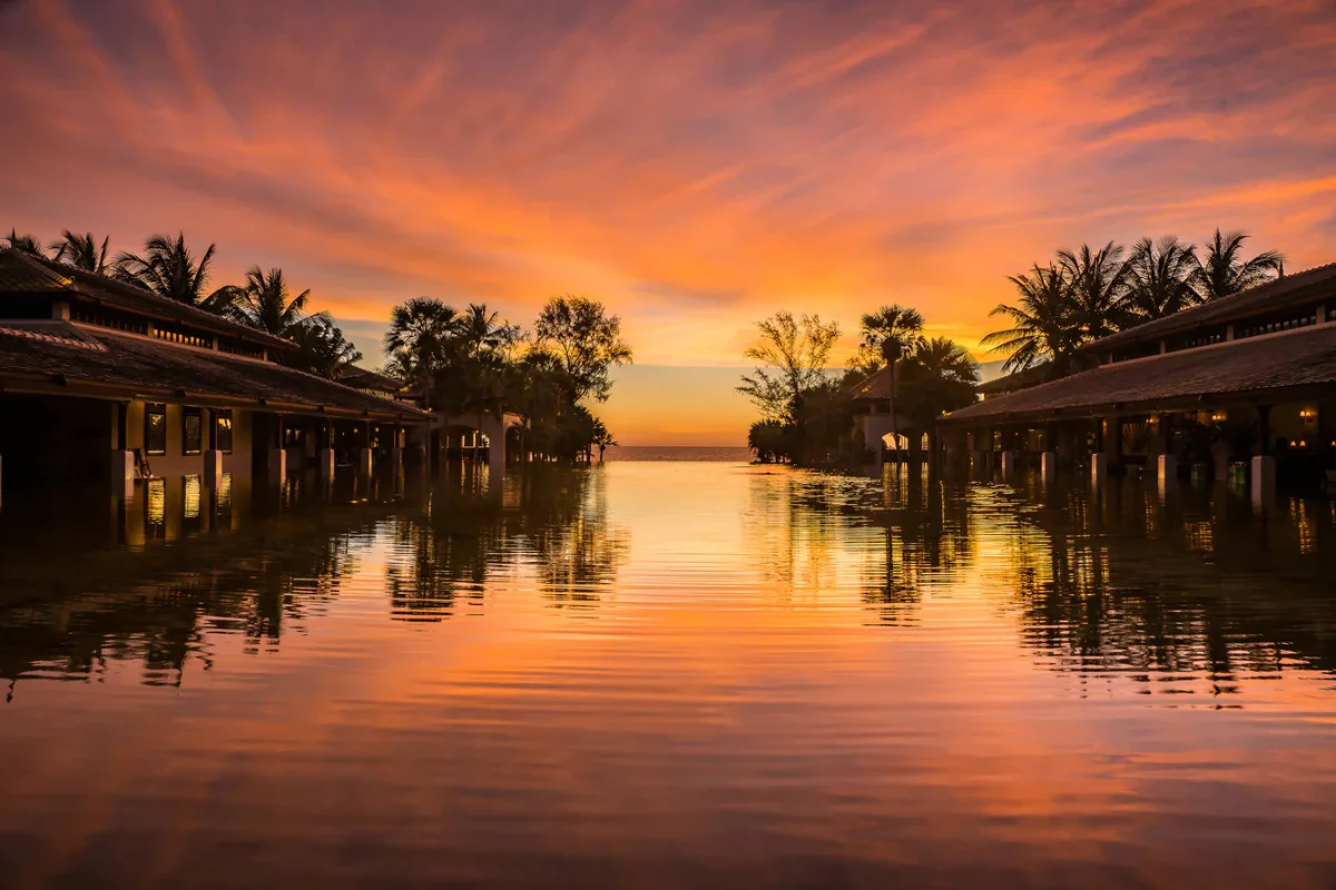 JW Marriott Phuket Resort outdoor reflection pool viewing sunset over Mai Khao beach